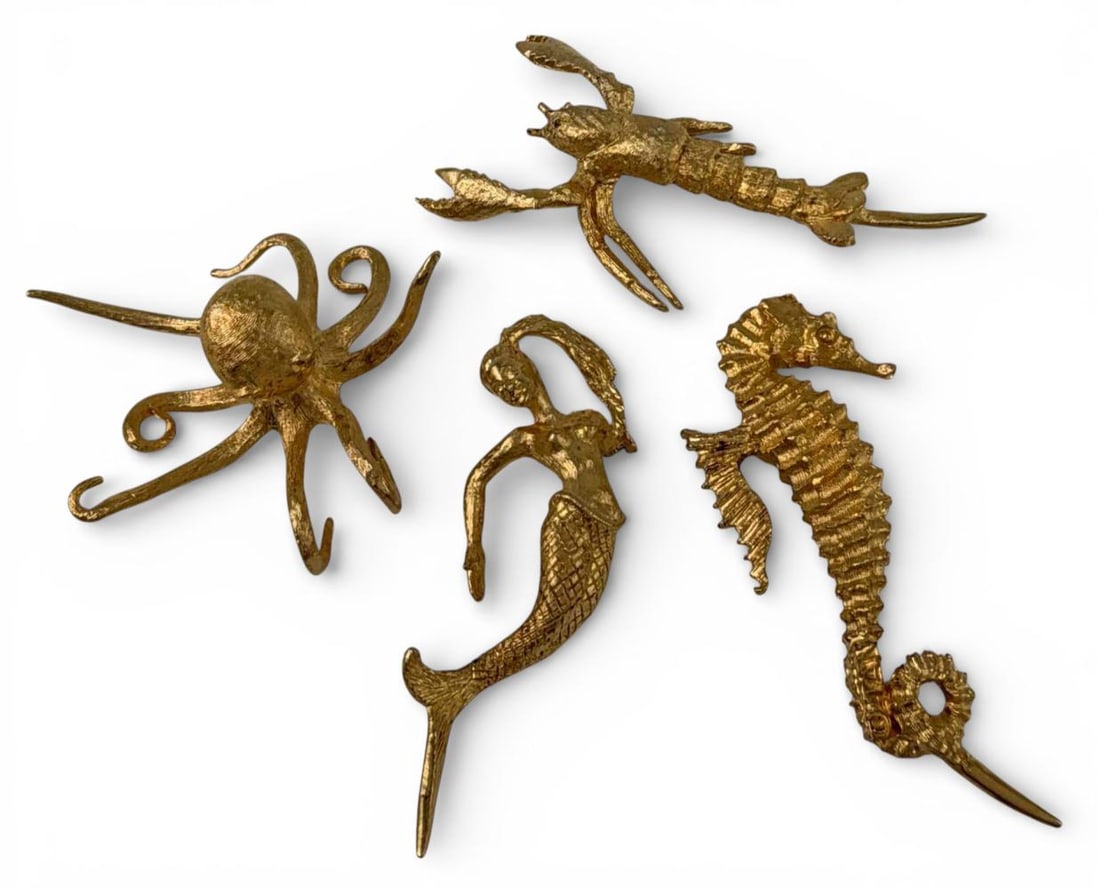 Tancraft Janis Collection Ocean Themed Gold Plated Cocktail Markers: Tancraft Janis Collection Ocean Themed Gold Plated Cocktail Markers. Marked "Tan." Largest (octopus) approximately 2.0L x 1.60W x 1.0H in.