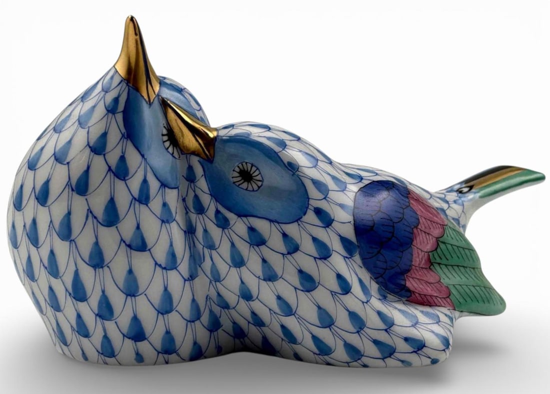 Herend Blue Fishnet Porcelain Lovebirds Figure: Herend Blue Fishnet Porcelain Lovebirds Figure Group. Marked "Herend Hungary Handpainted 5059/VHB F96." Proceeds from this lot benefit Grey Bears Nonprofit Organization.Grey Bears improves the health