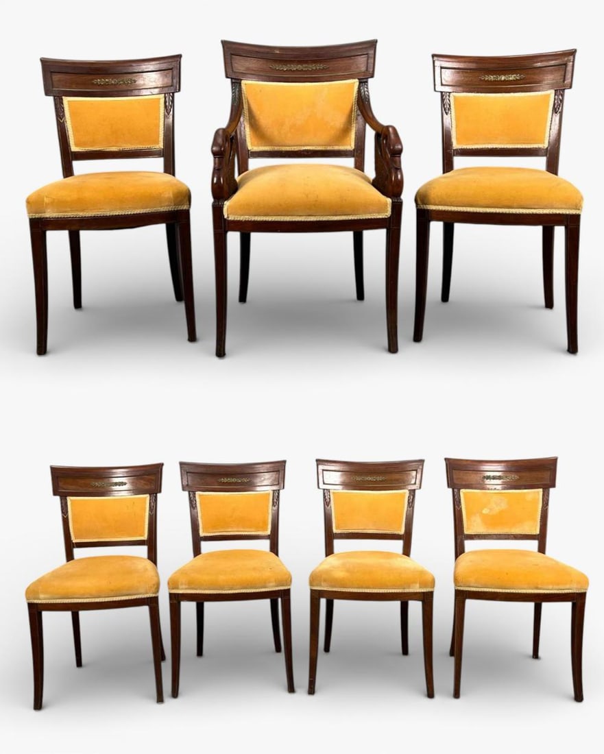 Set Of Empire Mahogany Dining Chairs With Brass Mounts, Including Swan-Form Armchair: Set Of Empire Mahogany Dining Chairs With Brass Mounts, 19th Century. Includes six side chairs and swan form armchair. Side chairs approximately 34.25H x 18.25W x 17.0D in.