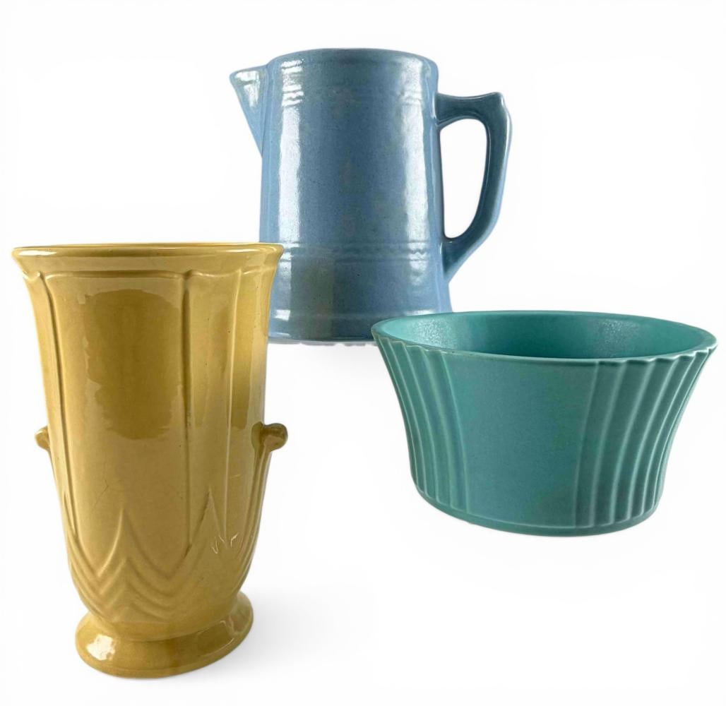 Group Of Three Mid-Century American Art Pottery Articles, California School: Group Of Three Mid-Century American Art Pottery Articles, California School. Yellow fluted vase marked "127/- USA," approximately 10.0H x 6.5W in. Pitcher unmarked, approximately 8.75H x 9.5L x 6.62W