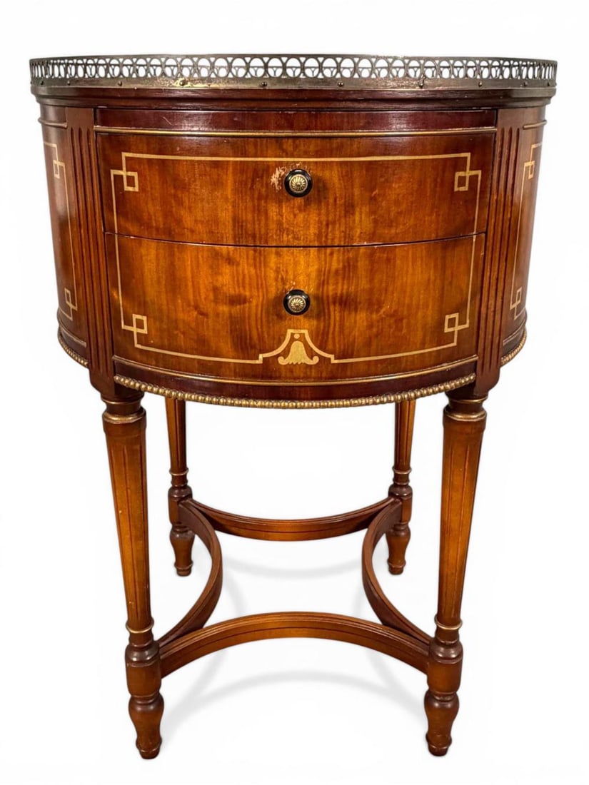 Imperial Grand Rapids Brass Mounted Drum Table: Imperial Grand Rapids Brass Mounted Drum Table. Inner drawer marked "Imperial Grand Rapids Mich. Made in Grand Rapids." Approximately 25.75H x 18.0W in. Please note that winning bidders are not requir