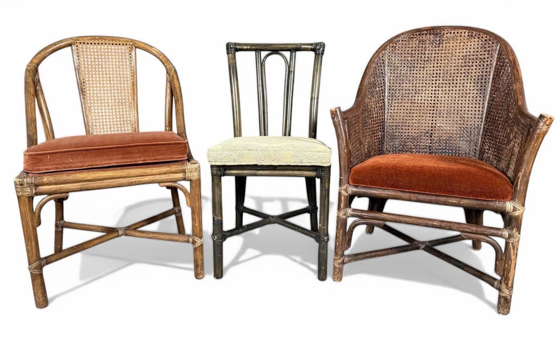 Three McGuire Rattan Chairs: Three McGuire Rattan Chairs. Attached tags marked "McGuire San Francisco." Double caned arm chair approximately 35.5H x 24.0W x 19.0D in. Cane back chair approximately 34.0H x 21.0W x 18.0D in. Smalle