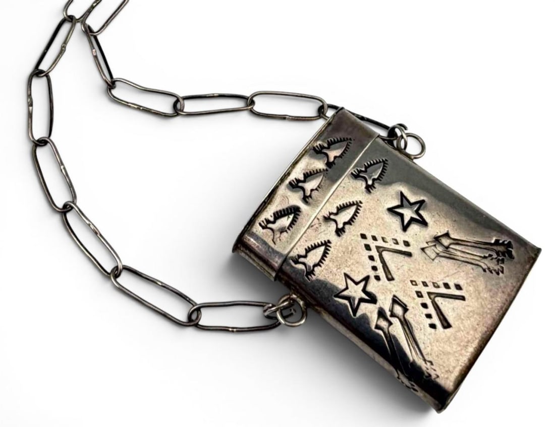 Native American Hand Stamped Sterling Silver Box Necklace: Native American Hand Stamped Sterling Silver Box Necklace, 21.0g. Signed "LHTC 87-88." Tests as sterling. Necklace length approximately 24.25in. Box pendant approximately 1.4H x 1.18W x 0.44D in . Ple