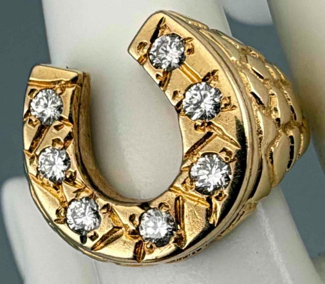 14K Diamond Horseshoe Ring: 14K Diamond Horseshoe Ring, 9.4g. Marked "14K." Width at front of ring approximately 17.6mm. Diamonds approximately 2.4mm. Approximate ring size 8.5. ALL CREDIT CARDS WILL BE MANUALLY VERIFIED PRIOR T