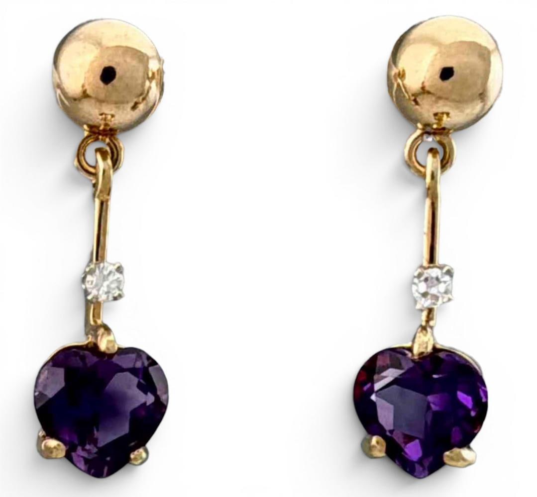 14K Amethyst & Diamond Heart Earrings: 14K Amethyst & Diamond Heart Earrings, 2.5g. Backings marked "14KT." Earrings test as 14K. Approximately 20.0L x 5.9mm. Amethyst approximately 5.8 x 5.9mm. ALL CREDIT CARDS WILL BE MANUALLY VERIFIED