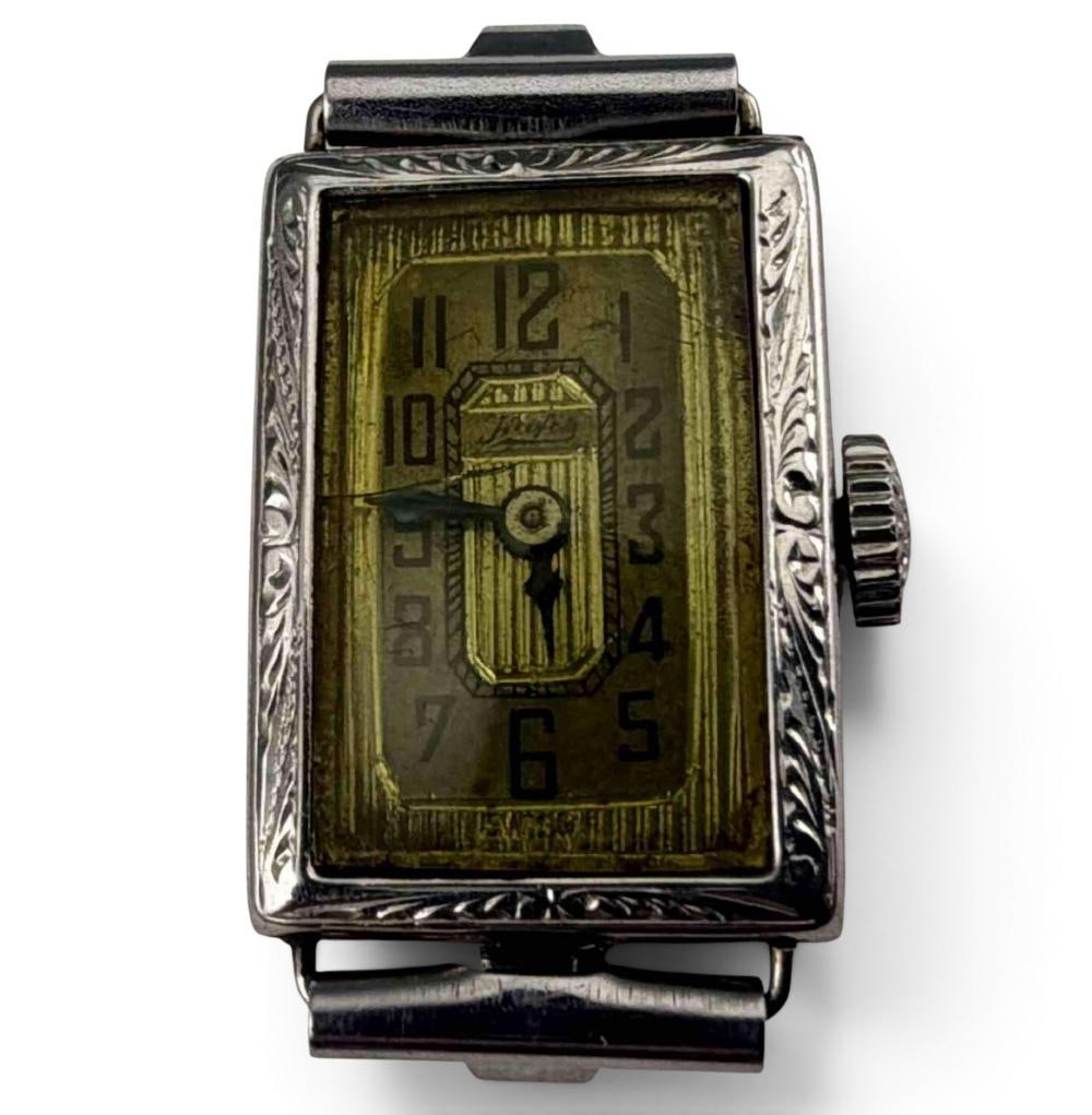 Art Deco 14K Haks Watch Co. Lady's Watch: Art Deco 14K Haks Watch Co. Lady's Watch. Case marked "Star Watch Case Co. 14K 585/1000 Fine" 3.6g. Movement marked "Haks Watch Co. Fifteen 15 Jewels." 21.2L x 14.9W mm. ALL CREDIT CARDS WILL BE