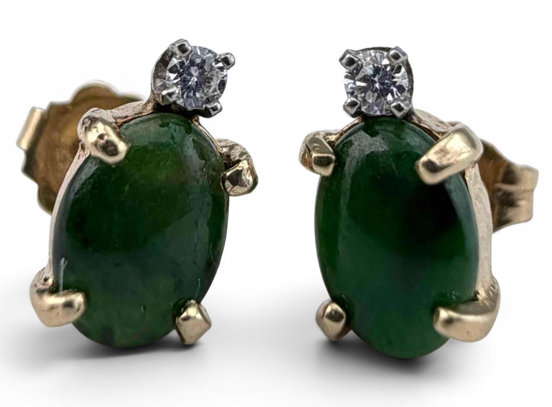 14K Emerald & Diamond Earrings: 14K Emerald & Diamond Earrings, 1.6g. Backings marked "14K," earrings test as 14K. Earrings approximately 9.2 x 5.5mm. Emeralds approximately 6.5 x 4.7mm. ALL CREDIT CARDS WILL BE MANUALLY VERIFIED