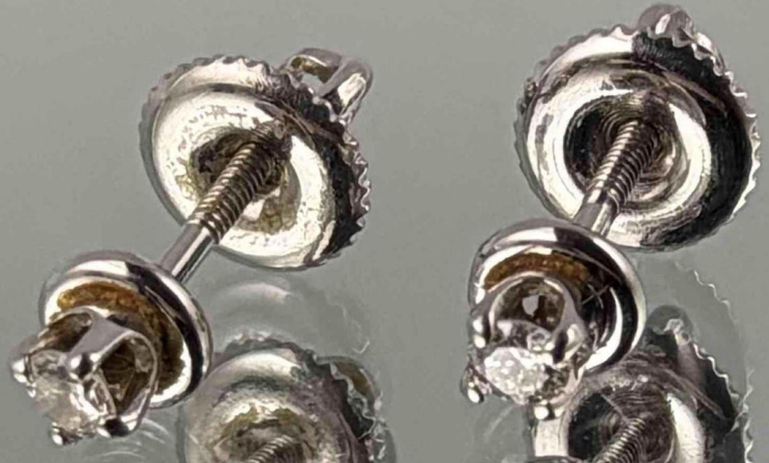 14K White Gold Diamond Earrings: 14K White Gold Diamond Earrings, 1.1g. Marked "14KT." Earrings approximately 4.0mm. Diamonds approximately 2.0mm. In box from Granat Bros Jewelers, San Francisco. ALL CREDIT CARDS WILL BE MANUALLY