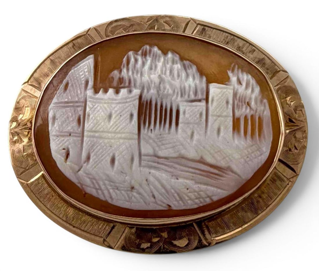 Antique 10K Cameo Brooch With Castle Landscape: Antique 10K Cameo Brooch With Castle Landscape, 4.5g. Marked "FMCO 10K." Approximately 1.5L x 1.15W in. Cameo approximately 29.2 x 21.5mm. ALL CREDIT CARDS WILL BE MANUALLY VERIFIED PRIOR TO SHIPMENT.