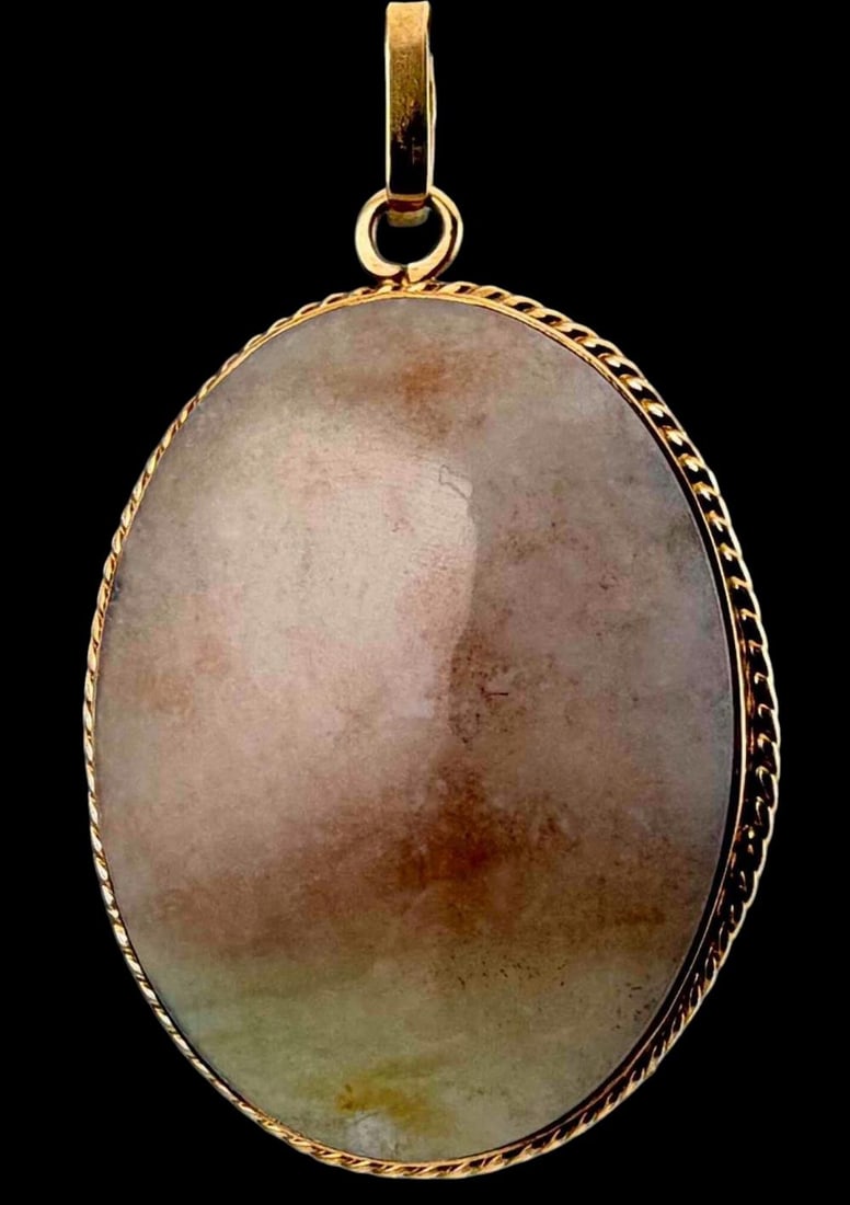 Large 14K Jade Pendant: Large 14K Jade Pendant, 13.4g. Marked "14K." Stone approximately 39.1 x 29.7W mm. Pendant, including bale, approximately 55.3L x 32.5W mm. ALL CREDIT CARDS WILL BE MANUALLY VERIFIED PRIOR TO SHIPMENT.