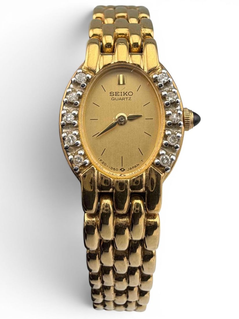 Seiko Vintage Diamond Set Ladies' Watch: Seiko Vintage Diamond Set Ladies' Watch. Back of case marked "Base metal St. Steel Back 1F20-5G19 RO 217600." Clasp marked "Seiko Base Metal Japan Z Z-5384-F." Width of case approximately 15.8mm.