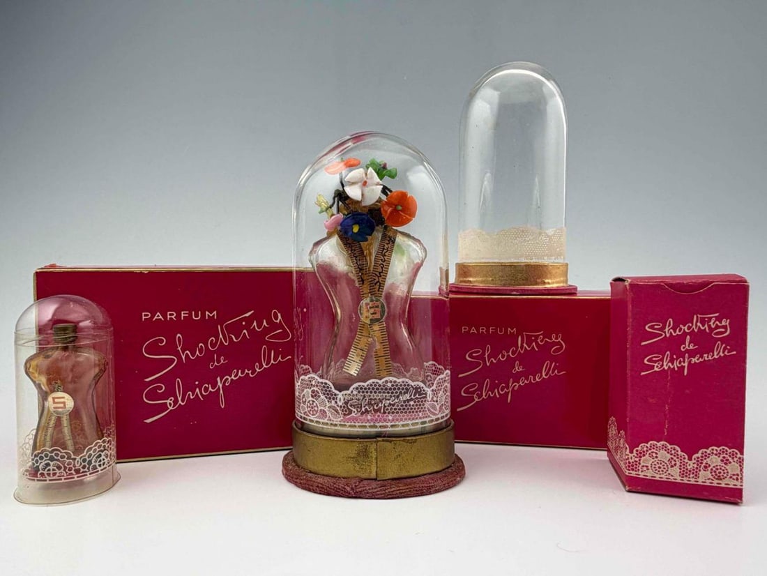 Vintage Elsa Schiaparelli "Shocking" Perfume Bottles & Boxes: Vintage Elsa Schiaparelli "Shocking" Perfume Bottles & Boxes. Larger bottle approximately 3.62H x 1.75W in. Largest box approximately 5.12L x 3.0W x 2.37D in. Smaller bottle approximately 1.9H x 1.0W 