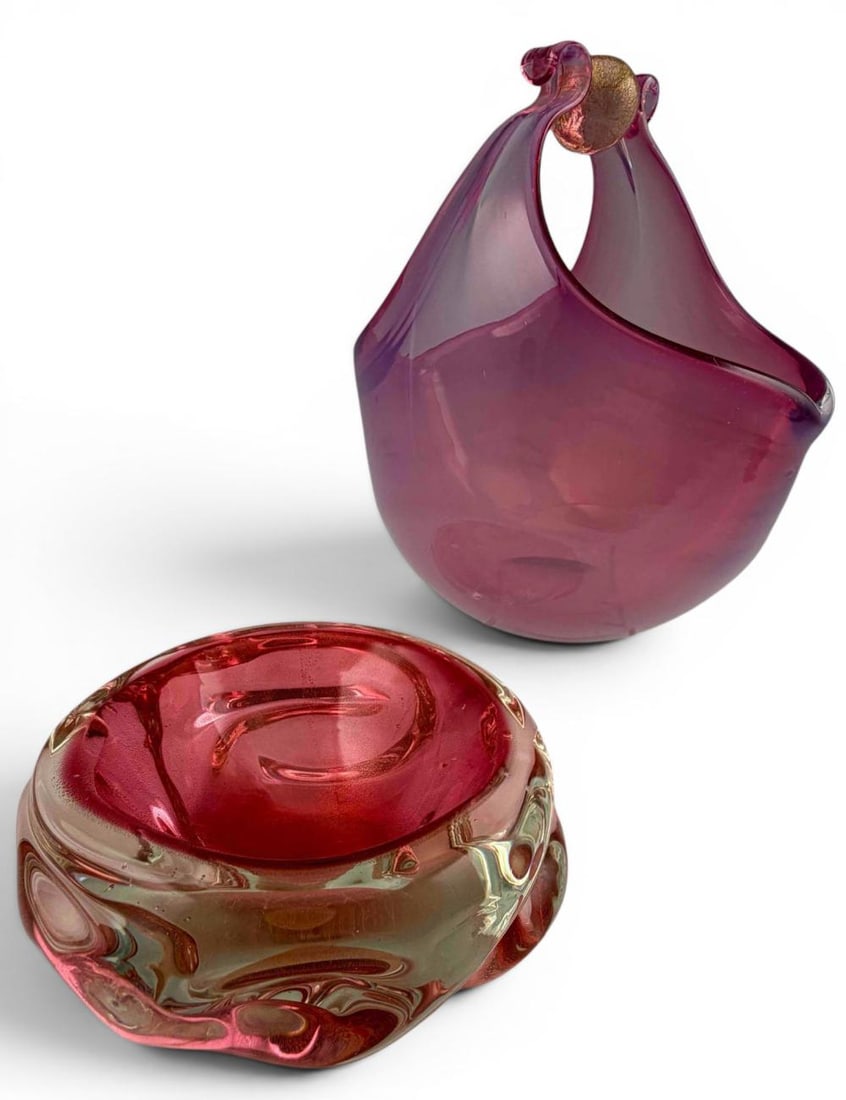 Two Murano Pink & Gold Fleck Art Glass Pieces: Two Murano Pink & Gold Fleck Art Glass Pieces. Basket form dish approximately 6.5H x 6.0L x 4.0W in. Bowl approximately 5.0L x 5.12W x 2.12H in.