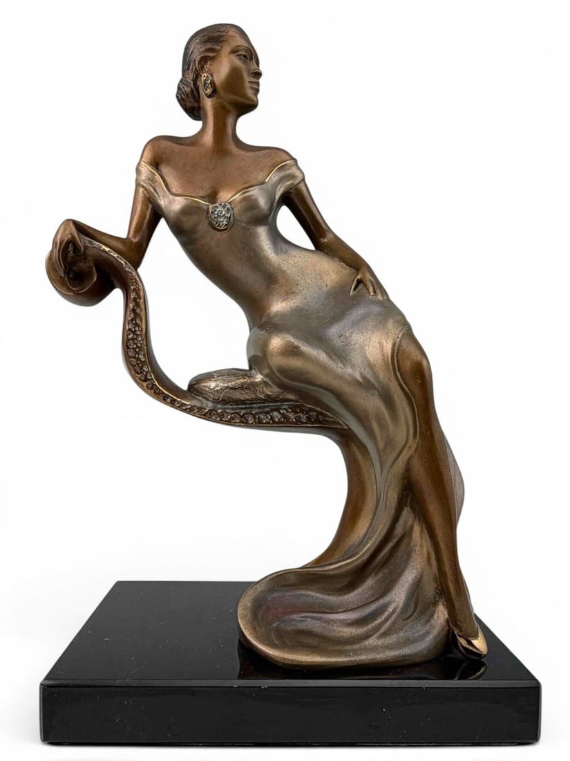 Alice Riordan (American, 20th C.), Reclining Woman, Bronze: Alice Riordan (American, 20th C.), Reclining Woman, Bronze. Signed "Riordan." Marked "Icarus 1994 273/1200." Approximately 10.12H x 6.0L x 4.0D in. Proceeds from this lot benefit Grey Bears nonprofit 