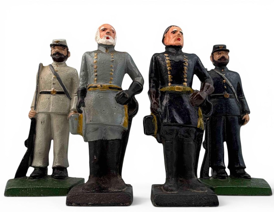 Set Of Four Cast Iron Civil War Doorstops: Set Of Four Cast Iron Civil War Doorstops. Figures include General Robert E. Lee, Ulysses S. Grant, and Confederate and Union Soldiers. Generals approximately 7.25H x 3.25W x 2.125D in. Soldiers appro
