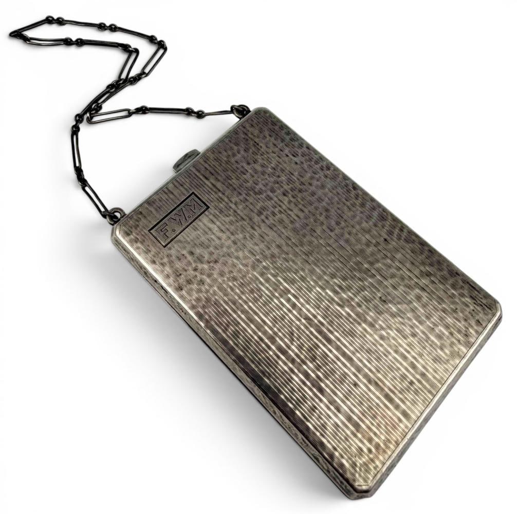 Art Deco Sterling Silver Dancing Purse: Art Deco Sterling Silver Dancing Purse, 137.4. Marked "Sterling JEB Co." Features compartments for coins, makeup, and dance card. Approximately 3.75L x 2.5W in. ALL CREDIT CARDS WILL BE MANUALLY VERIF