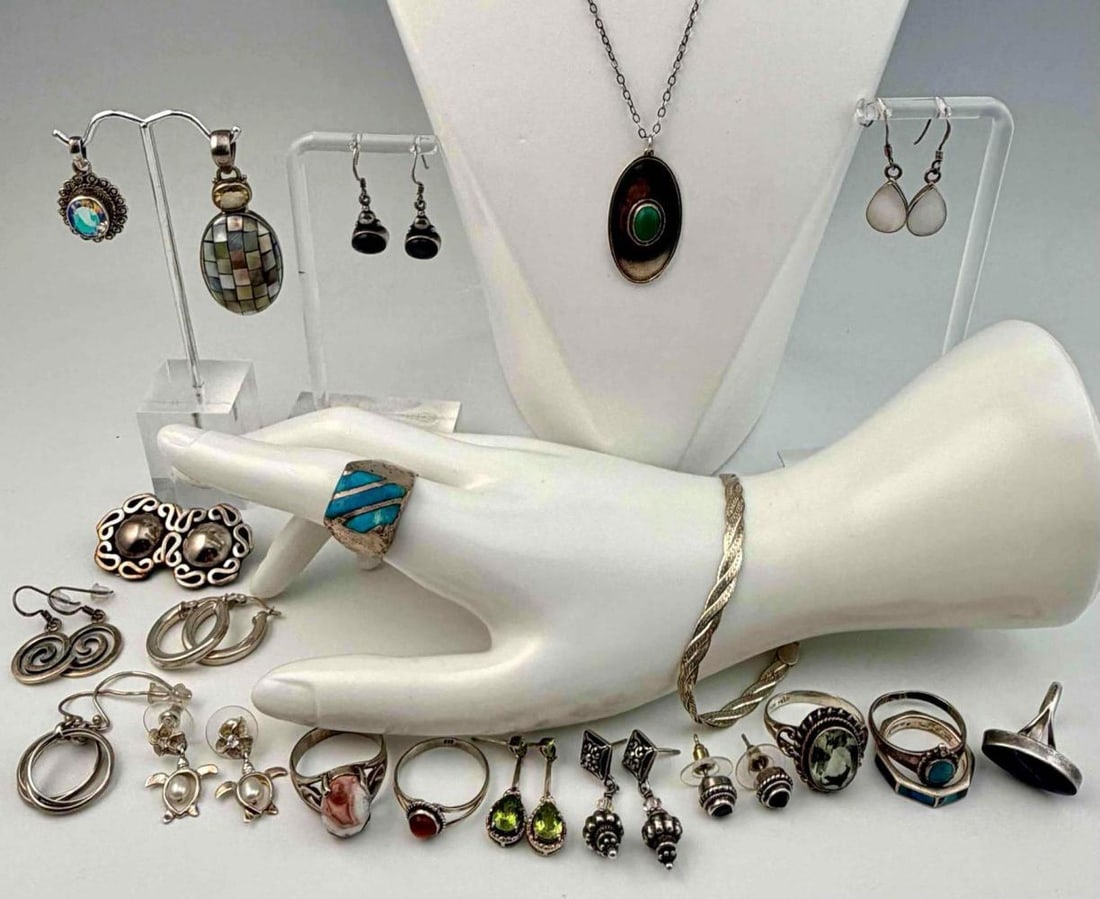 Lot Of Sterling Silver Jewelry: Lot Of Sterling Silver Jewelry, 92.4g total weight. Pieces marked or test as sterling. Bracelet length approximately 7.5in. Width approximately 4.2mm. Approximate ring sizes 5.5 - 9.5.