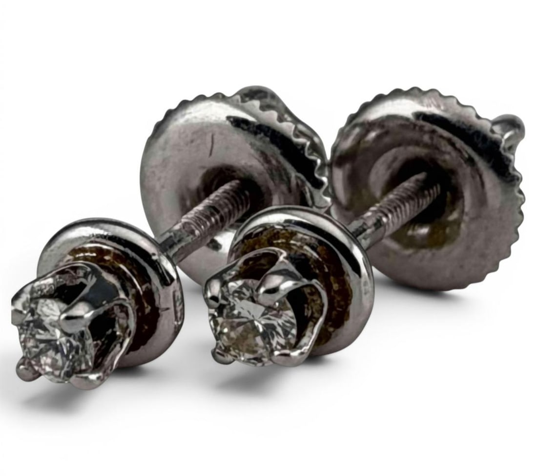 14K White Gold Diamond Earrings: 14K White Gold Diamond Earrings, 1.1g. Marked "14KT." Earrings approximately 4.0mm. Diamonds approximately 2.0mm. In box from Granat Bros Jewelers, San Francisco. ALL CREDIT CARDS WILL BE MANUALLY VER