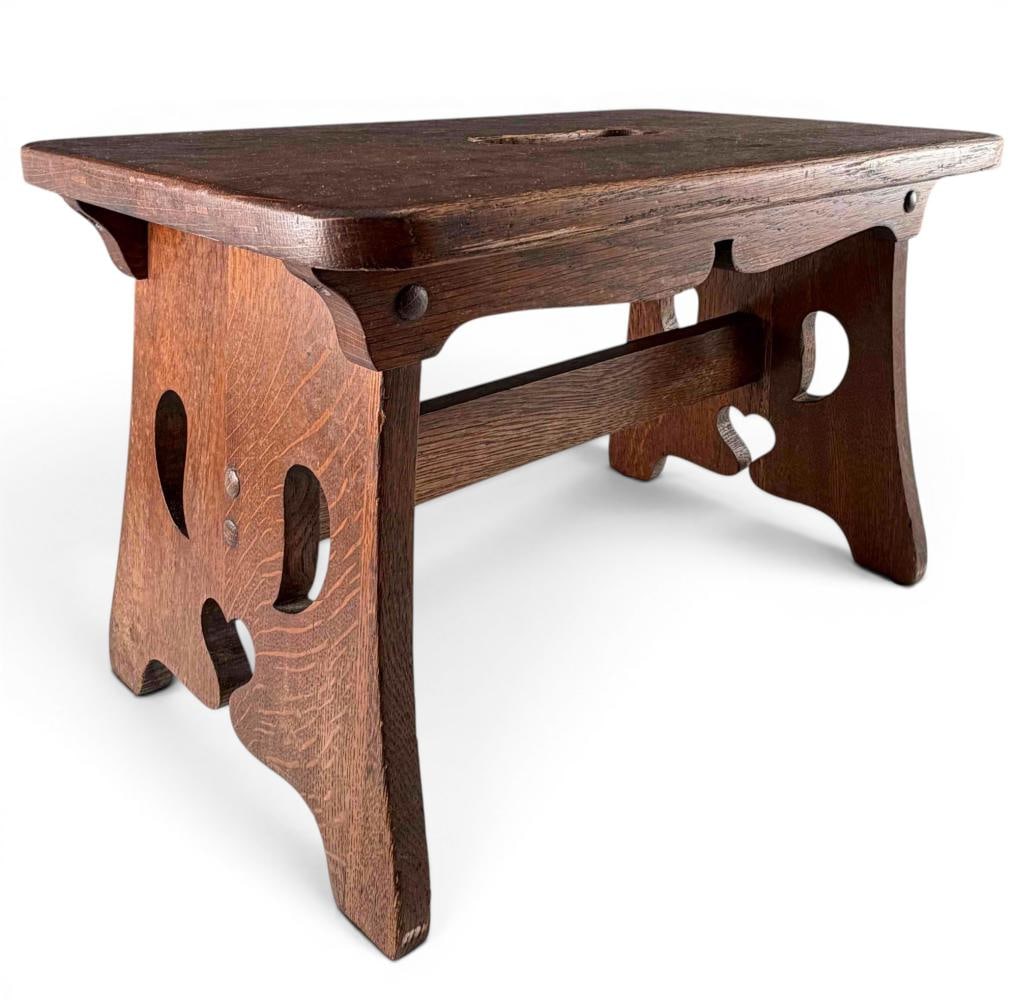 Limbert Arts & Crafts Oak Cricket Stool, No. 201: Limbert Arts & Crafts Oak Cricket Stool, No. 201. Underside marked "Limberts Art Crafts Made in Grand Rapids and Holland." Approximately 12.5H x 20.0W x 12.0D in.