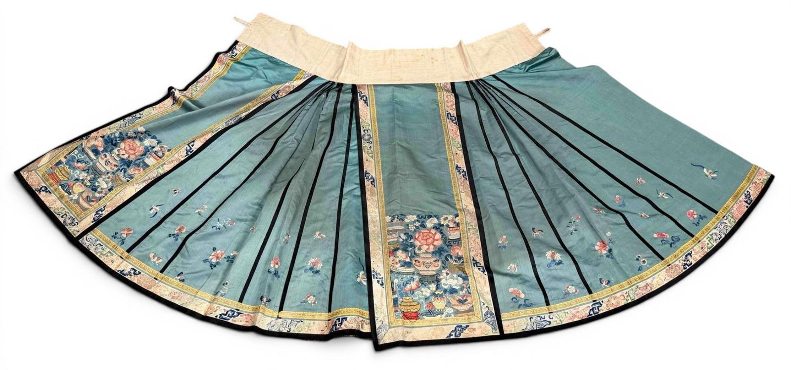 Chinese Embroidered Silk Skirt, Qing Or Early Republic Period: Chinese Embroidered Silk Skirt, Qing Or Early Republic Period, featuring a teal-green ground and black trim, with finely embroidered flowers, auspicious objects, and brocade-style border panels with b