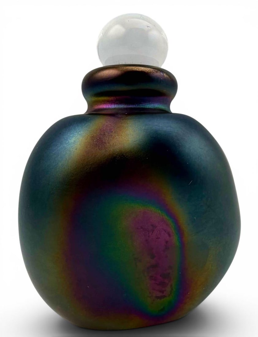 Eickholt Iridescent Art Glass Perfume Bottle: Eickholt Iridescent Art Glass Perfume Bottle. Signed at base. Dated 1987. Approximately 3.87H x 2.86W x 2.33D in.