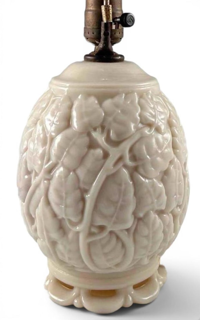 Aladdin Alacite "Oak Leaf" Two Light Table Lamp: Aladdin Alacite "Oak Leaf" Two Light Table Lamp. Approximately 10.5H x 5.62W in. (to base of socket). Height to finial approximately 17.25in. Shade approximately 8.25H x 12.25W in.