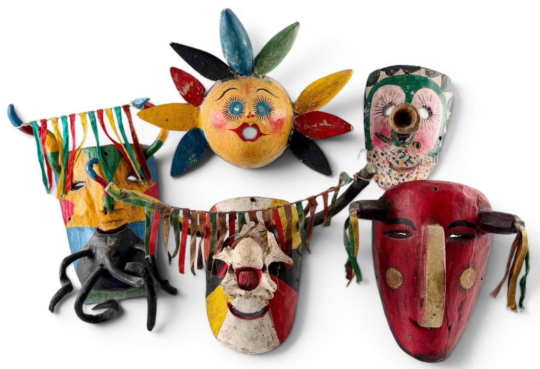 Group of Mexican Folk-Art Wood And Coconut Shell Masks: Group of Folk-Art Wood And Coconut Shell Masks, Mexican Or Central American. Largest approximately 12.25H x 8.0W x 4.0D in. Smallest approximately 6.5H x 4.5W x 4.0D in.