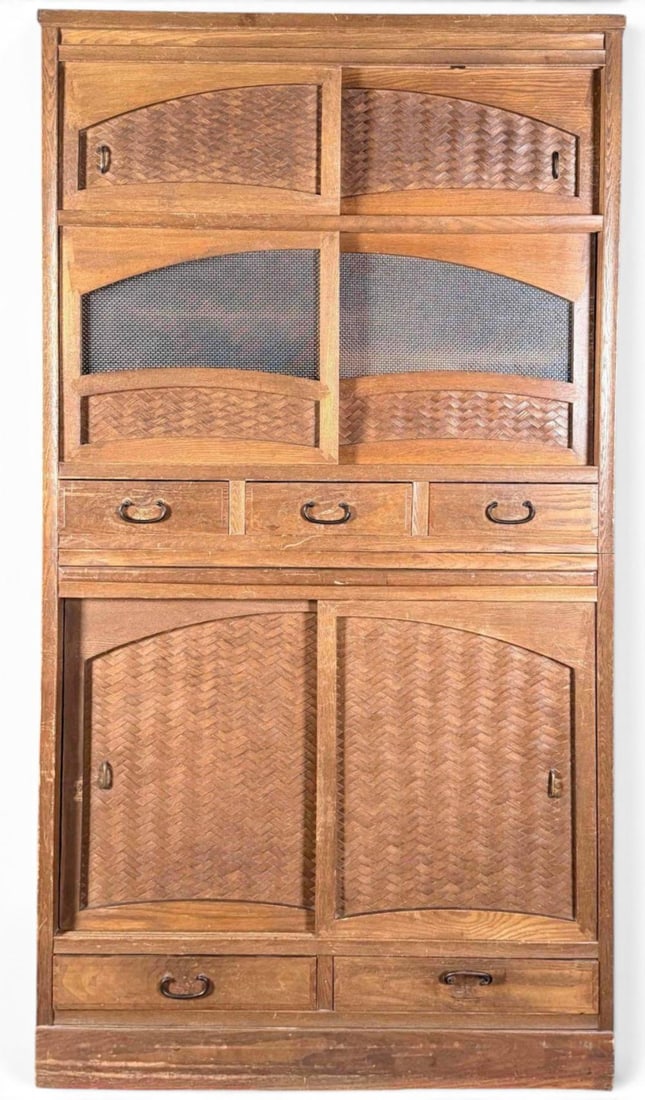Japanese Mizuya Tansu Kitchen Cabinet With Glass Sliding Doors: Japanese two-section mizuya tansu kitchen cabinet, featuring sliding doors with textured glass panels, woven-pattern wood panels, multiple drawers with dark metal pulls, and shelved interior storage c