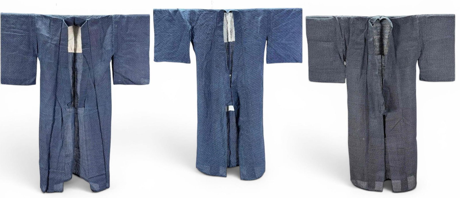 Three Older Japanese Indigo Kasuri Kimonos: Three Older Japanese Indigo Dyed Kasuri Kimonos.
