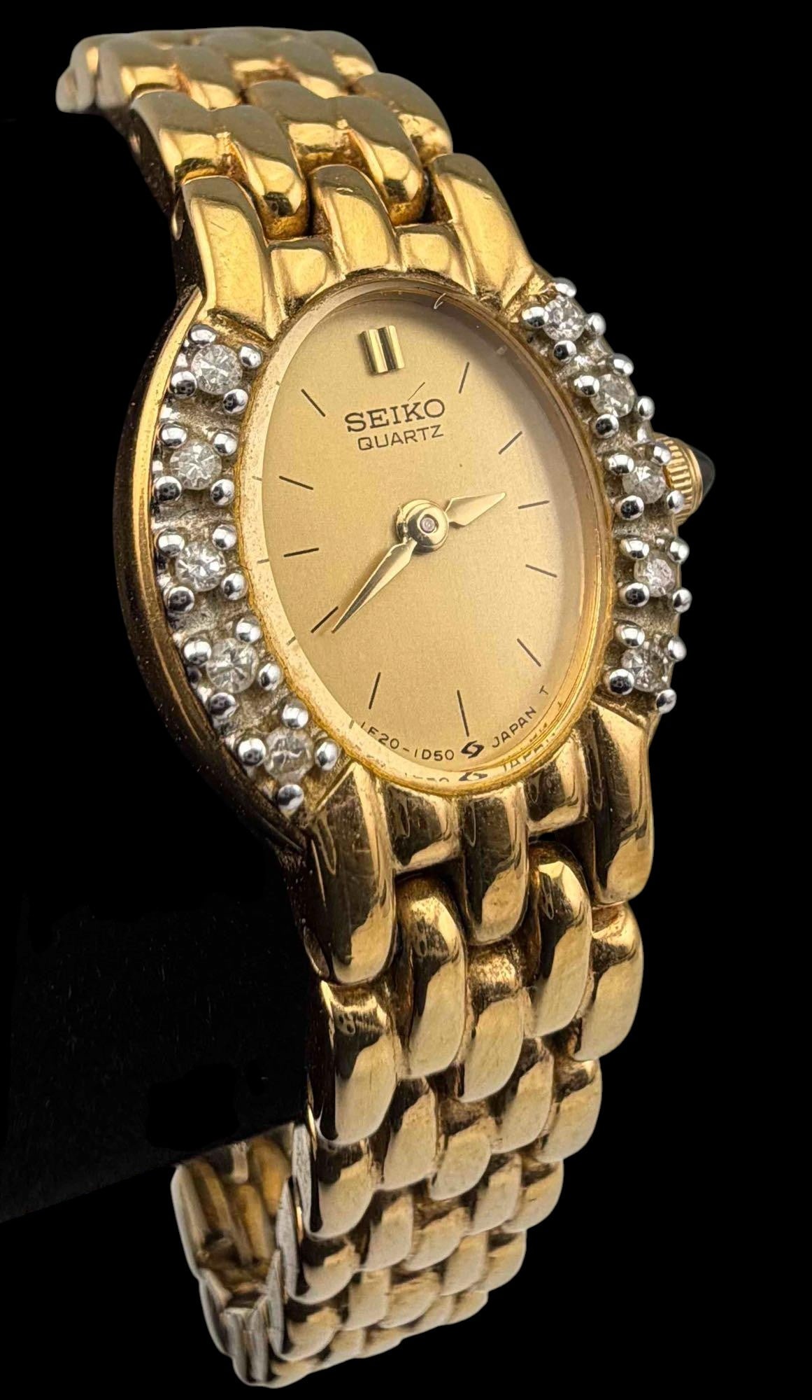 Seiko Vintage Diamond Set Ladies' Watch: Seiko Vintage Diamond Set Ladies' Watch. Back of case marked "Base metal St. Steel Back 1F20-5G19 RO 217600." Clasp marked "Seiko Base Metal Japan Z Z-5384-F." Width of case approximately 15.8mm.