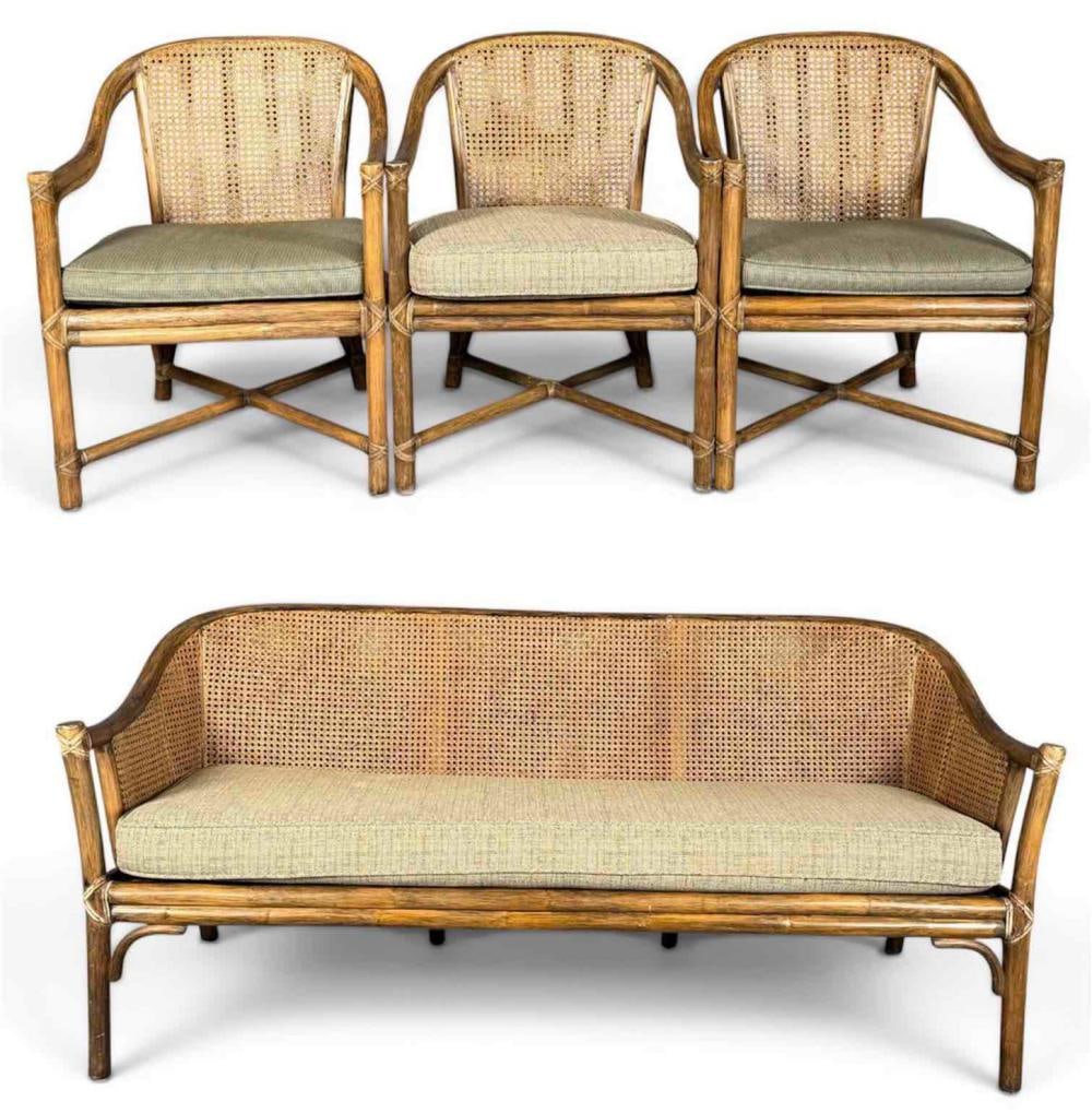 McGuire Rattan Sofa & Chairs: McGuire Caned Rattan & Rawhide Sofa And Armchairs. Attached tags marked "McGuire San Francisco." Sofa approximately 65.25L x 29.25H x 28.0D in. Chairs approximately 29.0H x 21.75W x 21.0D in.