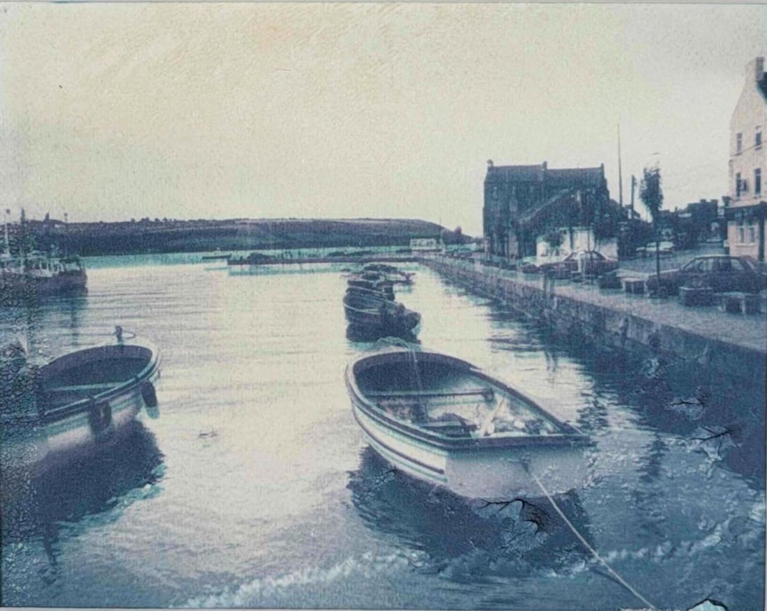 Gypsy Ray (1949-2020), Youghal Harbor, Ireland, Photograph, 1972: Gypsy Ray (1949-2020), Youghal Harbor, Ireland, Photograph, 1972. Signed, titled, and dated on mat. Gypsy Ray was an American-born photographer and visual artist who later lived and worked in County K