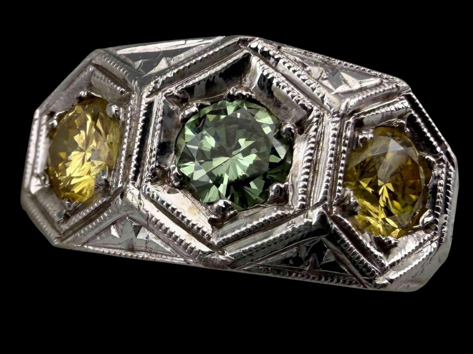 18K White Gold Green And Yellow Diamond Ring: 18K Irradiated Green And Yellow Diamond Ring, 8.3g. Marked 18K. Diamonds approximately 4.0mm/ Width at front approximately 9.4mm. Approximate ring size 9. Provenance: From the private collection of