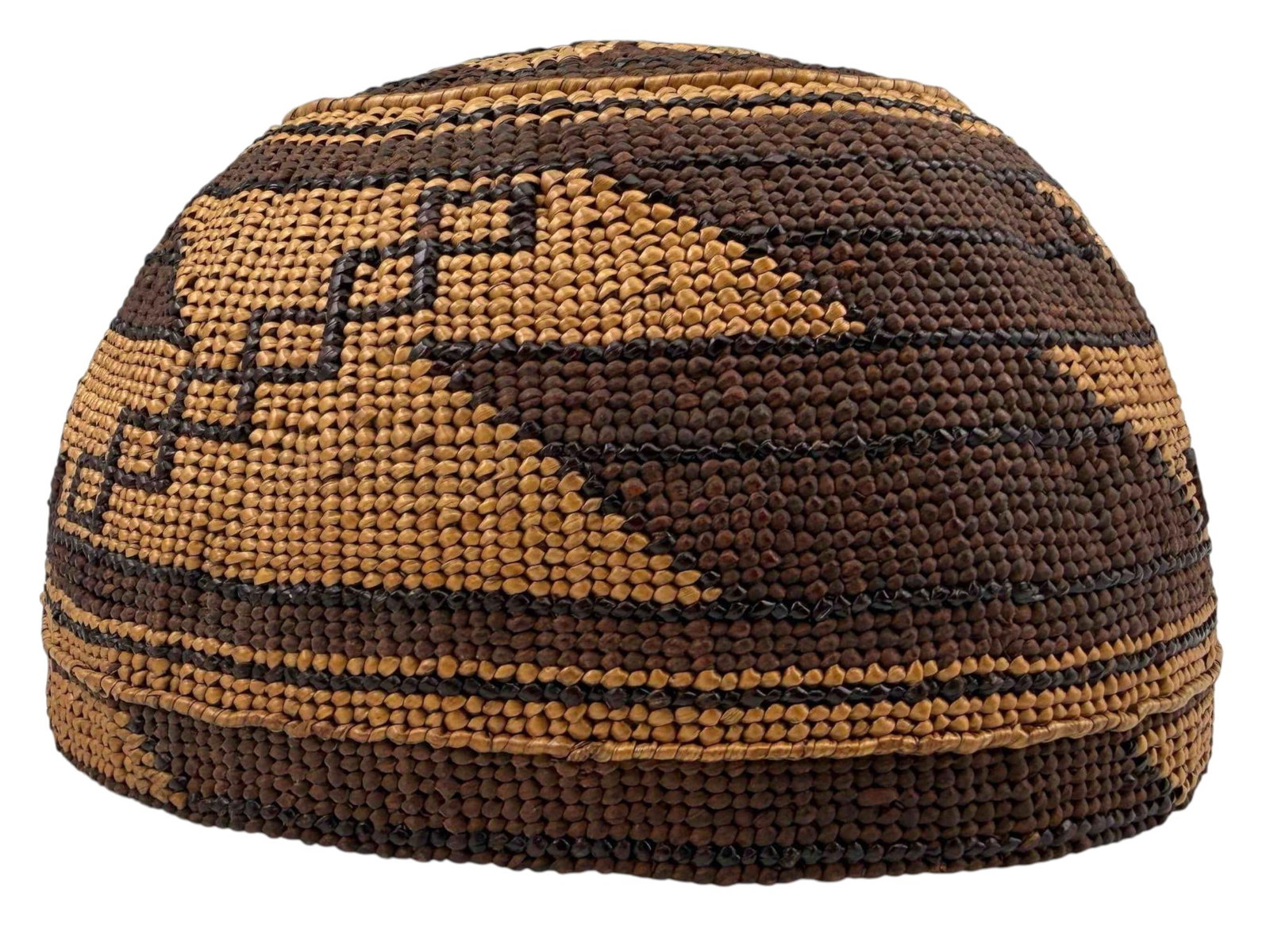 Hupa Native American Basket Hat, Color Reversed Obsidian Blade Pattern: Hupa Native American ceremonial basket cap featuring a color-reversed Obsidian Blade design. Northern California. Woven of natural plant fibers with contrasting tan and dark geometric decoration wrapp