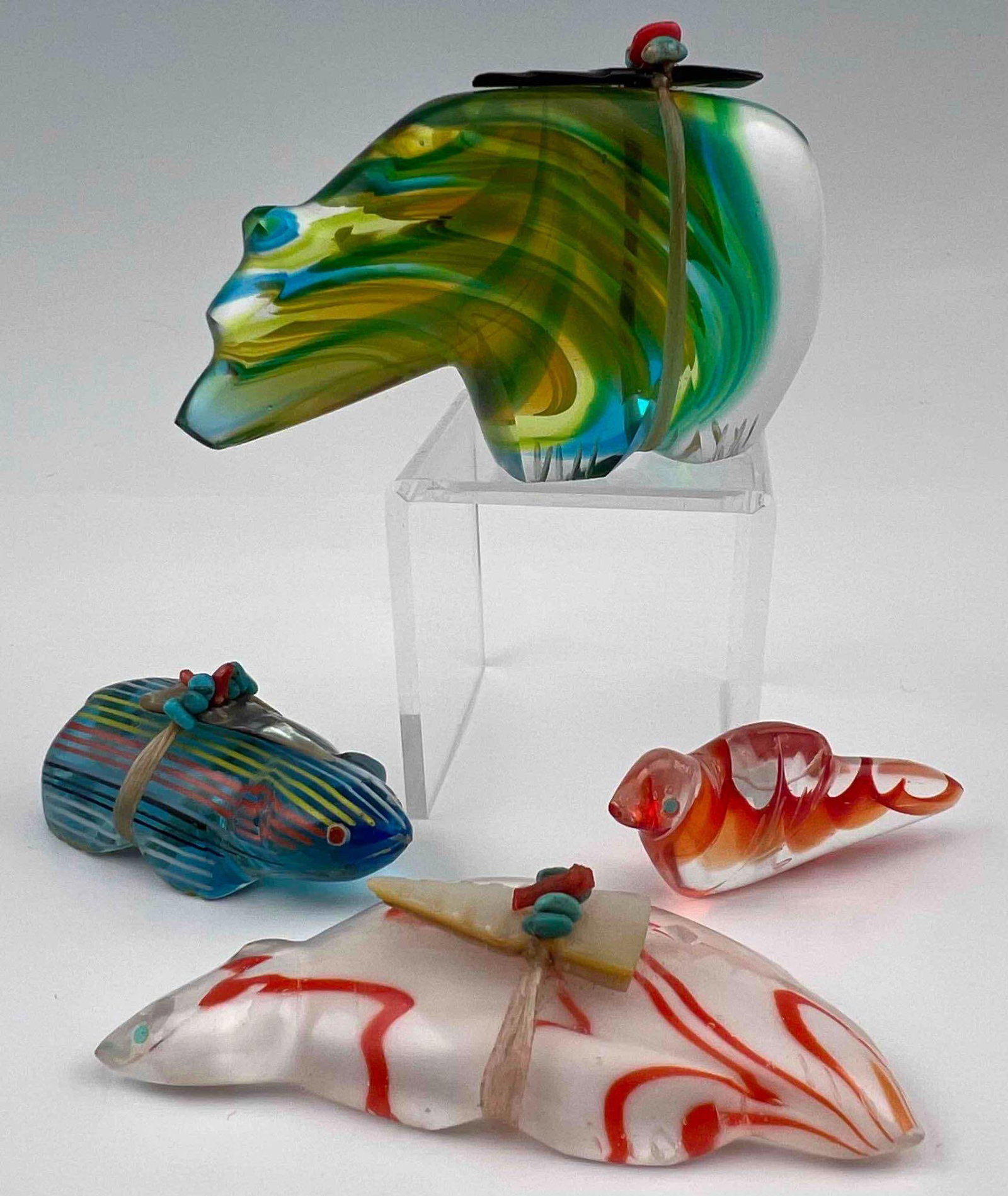 Four Zuni Art Glass Bear & Bird Fetishes: Four Zuni Art Glass Bear & Bird Fetishes. Marcel Chase Weahkee glass, shell, coral, and turquoise bear fetish signed "MCW." Lena Boone blue glass, mother of pearl, turquoise, and coral bear fetish sig