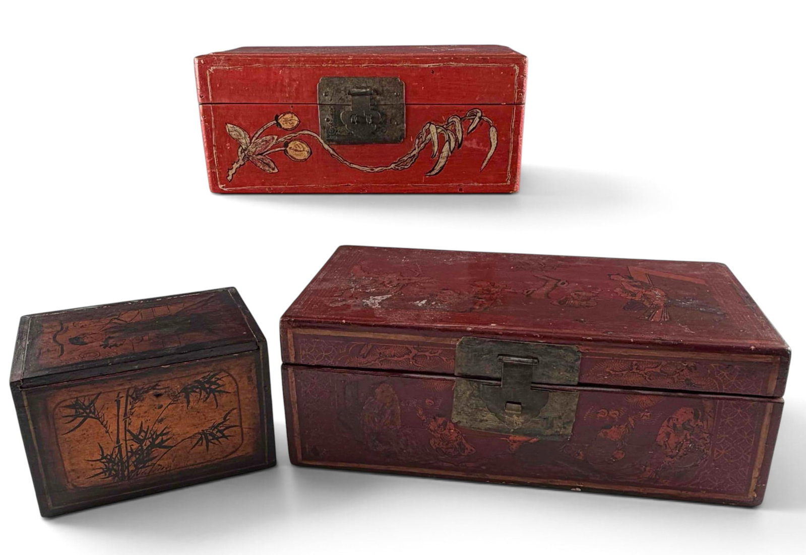Three Chinese Red Lacquer Storage Boxes With Figural & Floral Decoration: Three Chinese Red Lacquer Storage Boxes With Figural & Floral Decoration. Approximately 5.0H x 13.75W x 7.5D in. and 4.5H x 11.0W x 6.0D in.