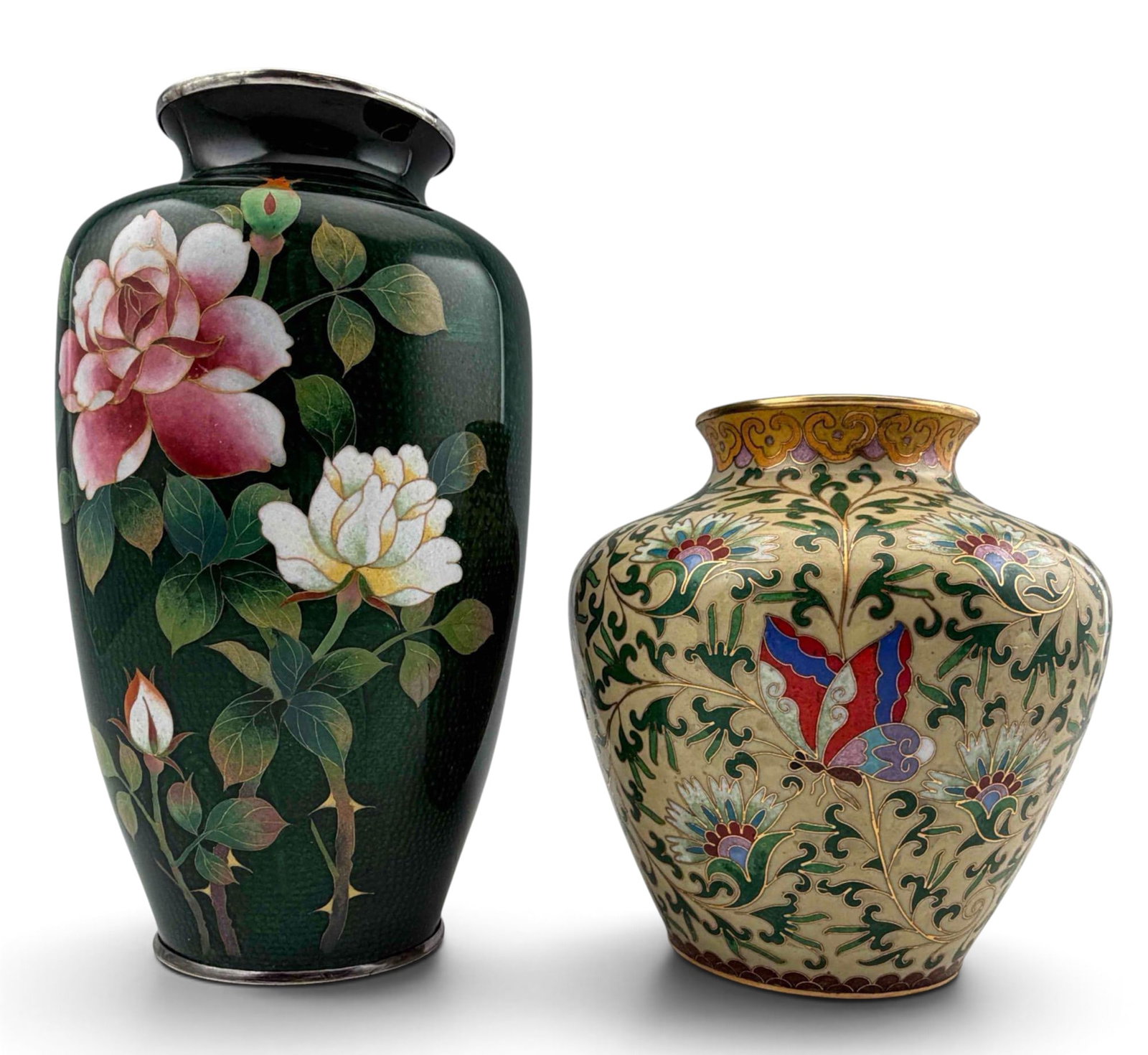 Two Japanese Cloisonne Enamel Vases, One With Silver Rim: Two Japanese Cloisonne Enamel Vases, One With Silver Rim. Unmarked, rim of larger vase tests as 800 silver. Approximately 7.25H x 4.0W in. and 5.0H x 4.70W in.