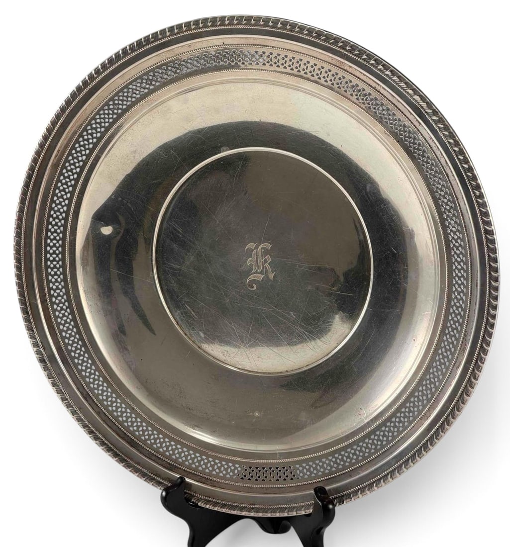 Reticulated Sterling Silver Serving Plate: Reticulated Sterling Silver Serving Plate, 466.0g. Marked "STERLING 2854 12 1/4 IN." "K" monogram. Approximately 12.25in. ALL CREDIT CARDS WILL BE MANUALLY VERIFIED PRIOR TO SHIPMENT.