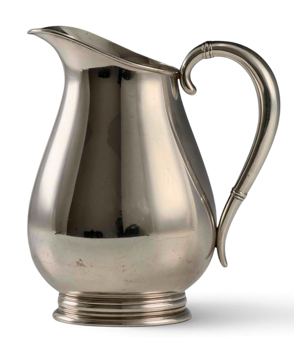 Royal Danish Sterling Silver Pitcher: International Royal Danish Sterling Silver Pitcher, 750.1g. Marked "Royal Danis U.S.A. International Sterling 4 PTS 130 17." No monogram. Approximately 8.37H x 7.37L x 5.5W in. ALL CREDIT CARDS WILL B