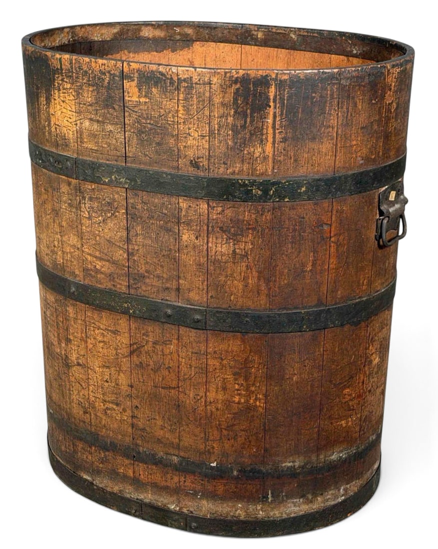 Antique Iron Banded Wood Barrel: Antique Iron Banded Wood Barrel. Approximately 27.0H x 23.25W x 18.37D in.