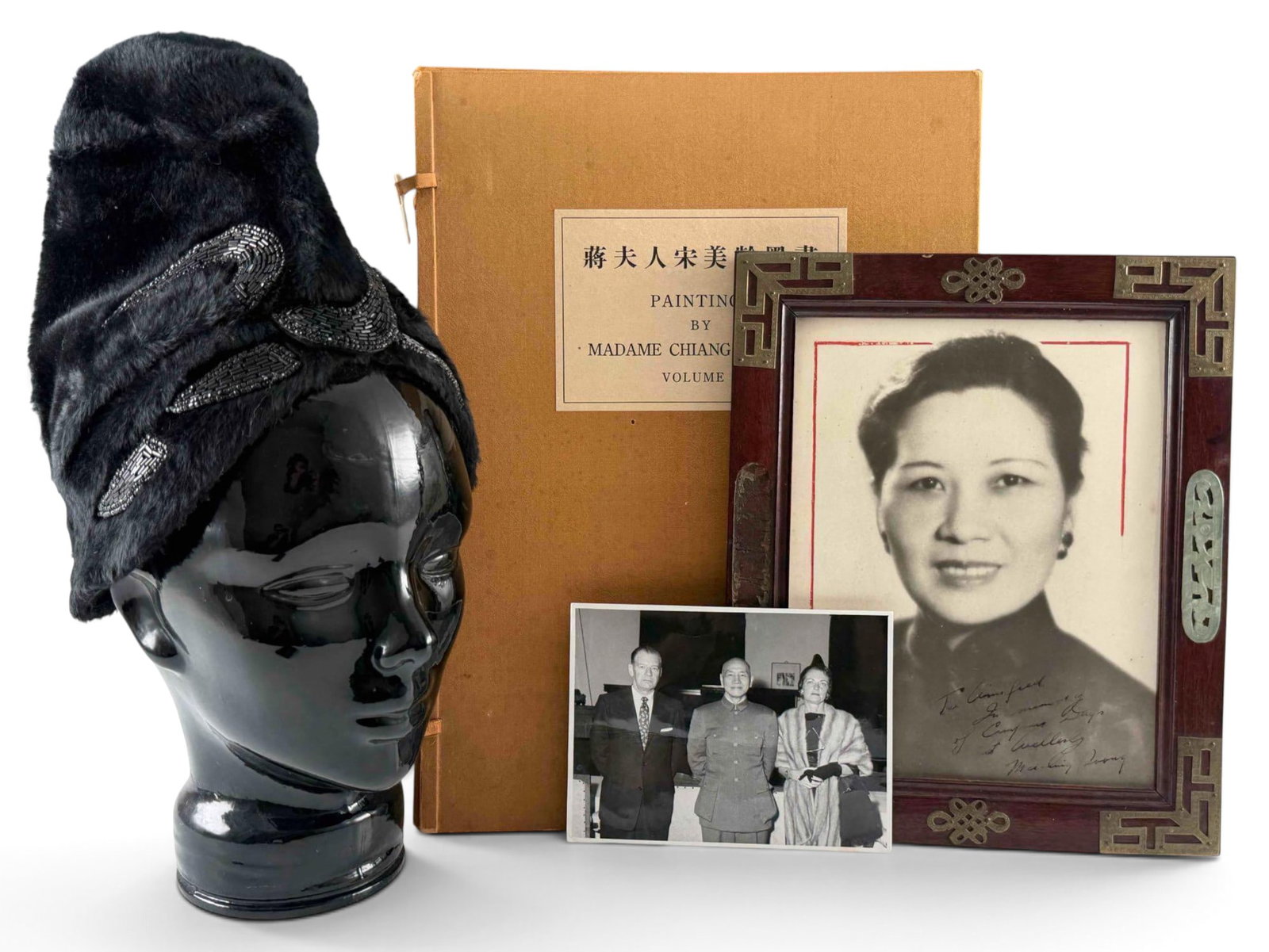 Madame Chiang Kai-Shek And President Chiang Kai-Shek Presentation Group: President Chiang Kai-shek and Madame Chiang Kai-Shek, Soong Mei-ling, group of presentation material relating to Colonel and Mrs. Fred W. Buechner, comprising: Photograph inscribed "To Winifred In mem