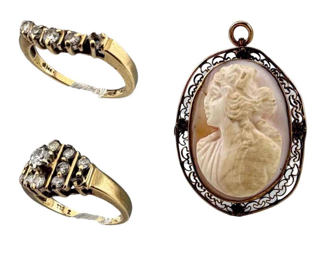 10k Gold Diamond & Cameo Lot: 10k Gold Diamond & Cameo Lot, rings 5.9g, cameo 5.7g. Brooch approximately 1.19 x 0.93in. Approximate ring size 6. ALL CREDIT CARDS WILL BE MANUALLY VERIFIED PRIOR TO SHIPMENT.