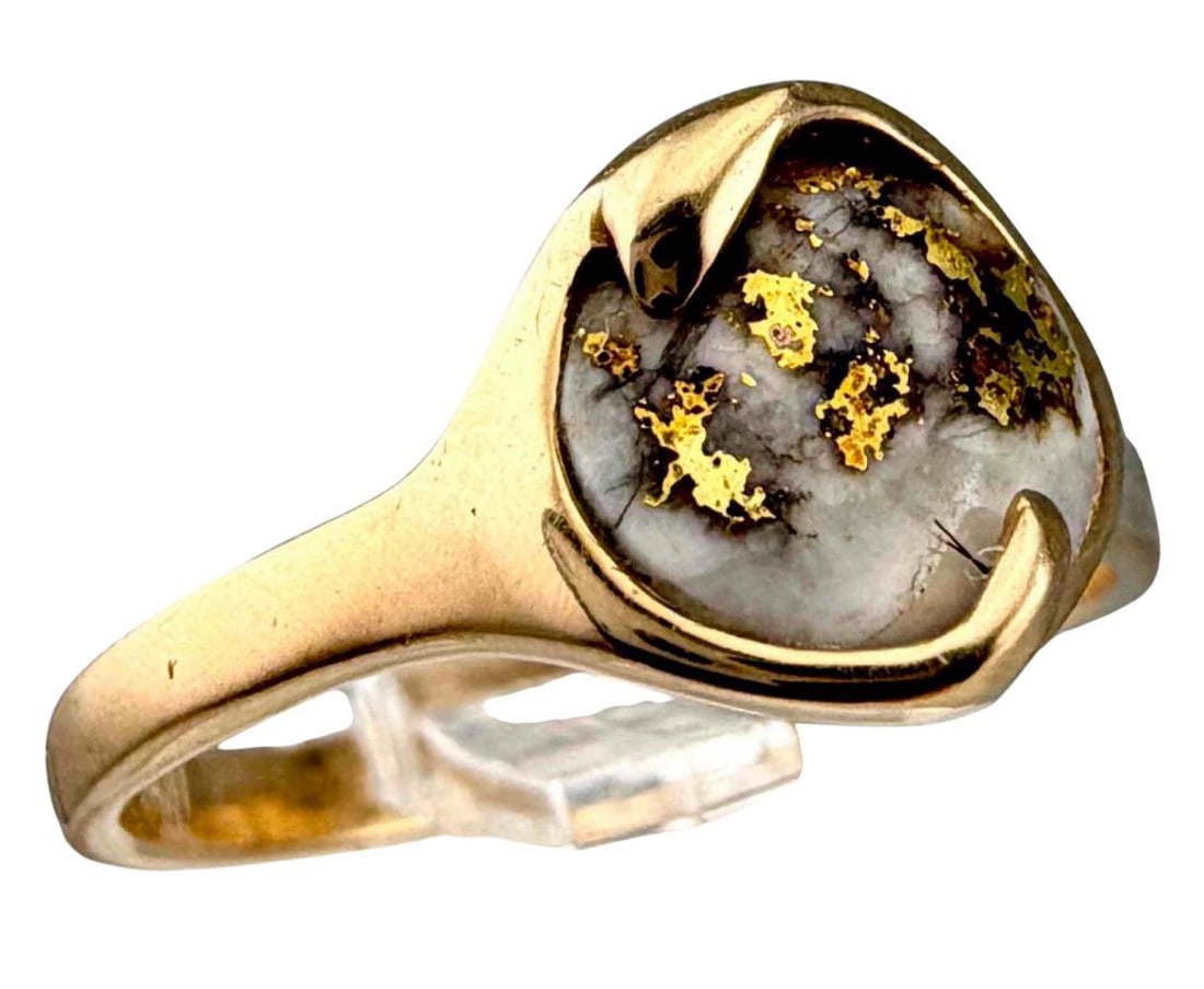 Alaskan 14k Gold Orocal Ring: Alaskan 14k Gold Orocal Ring, 3.8g. Approximate Ring Size 7.5. Marked "14K." ALL CREDIT CARDS WILL BE MANUALLY VERIFIED PRIOR TO SHIPMENT.