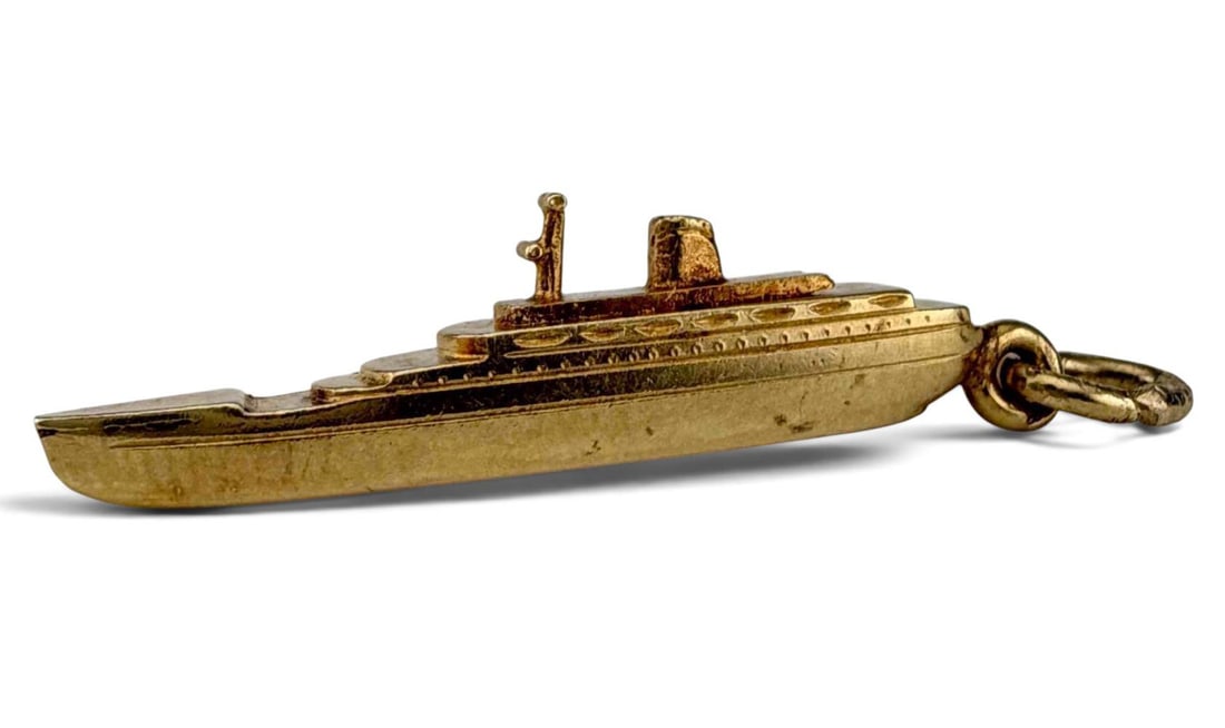 14k Gold U.S.S Fairsea Ship Charm: 14k Gold U.S.S Fairsea Ship Charm, 2.9g. Approximately 29.8 x 7.6 x 3.9mm. ALL CREDIT CARDS WILL BE MANUALLY VERIFIED PRIOR TO SHIPMENT.