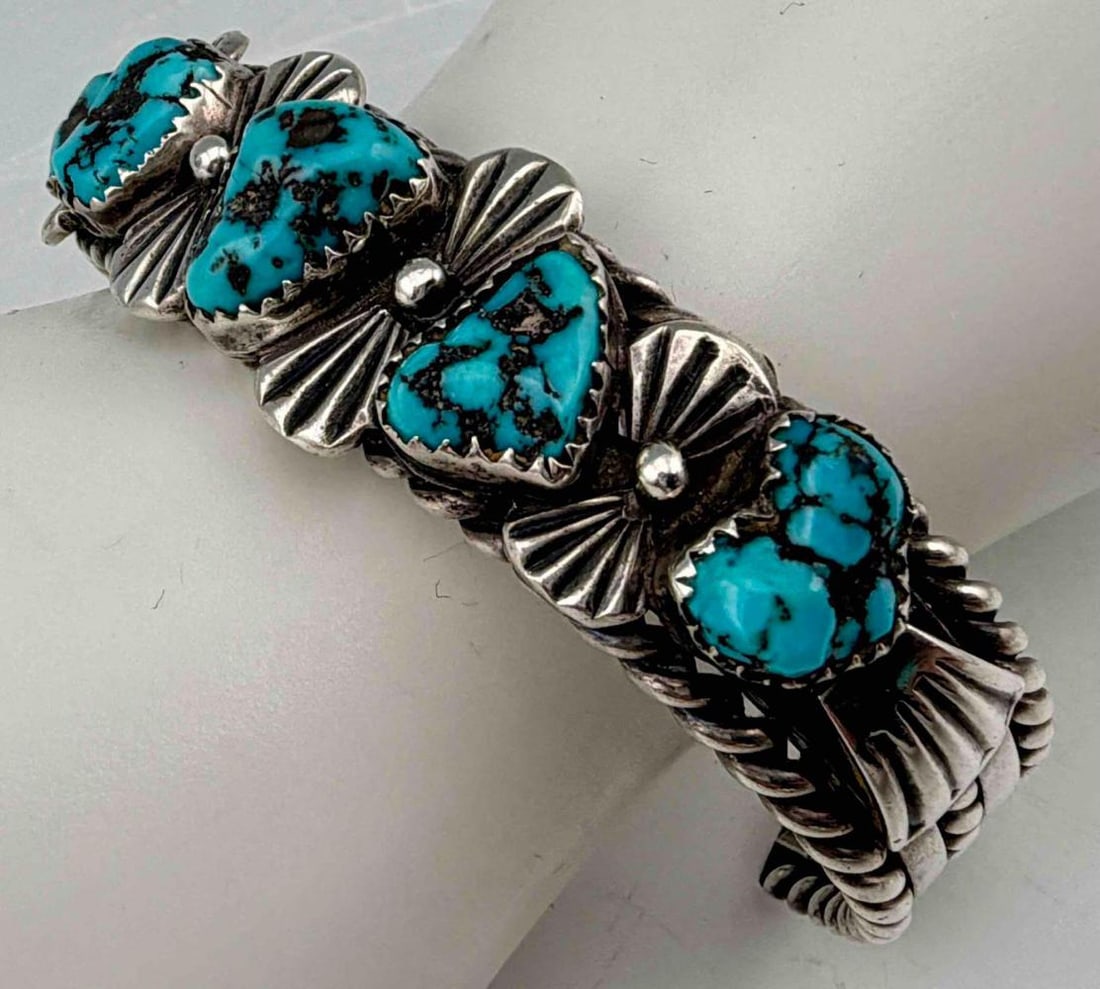 Vintage Navajo Dine' Sterling Silver Turquoise Nugget Cuff Bracelet, 55.6g.: Vintage Navajo Dine' Sterling Silver Turquoise Nugget Cuff Bracelet, 55.6g. Inner cuff approximately 6.0in. Cuff break approximately 1.50in. Width approximately 14.7 mm.