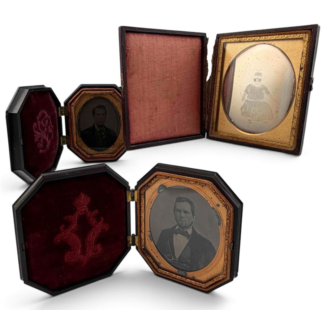Three Mid 19th C. Cased Photographs: Three Mid 19th C. Cased Photographs. Includes Daguerrotype of young child, and two ambrotype portraits of gentlemen in Gutta-Percha cases. Child portrait (case) approximately 3.62H x 3.25W in. Sight a