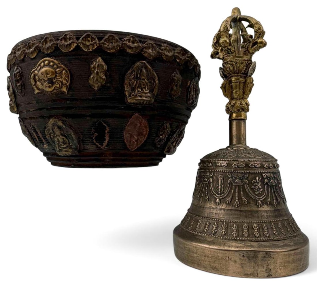 Tibetan Bronze Ritual Bell & Bowl: Tibetan Bronze Ritual Bell & Bowl. Ritual Bell with five pronged vajra handle with cast relief body. Interior ears a six pointed star with inscription. The accompanying bowl is turned wood, ornamented