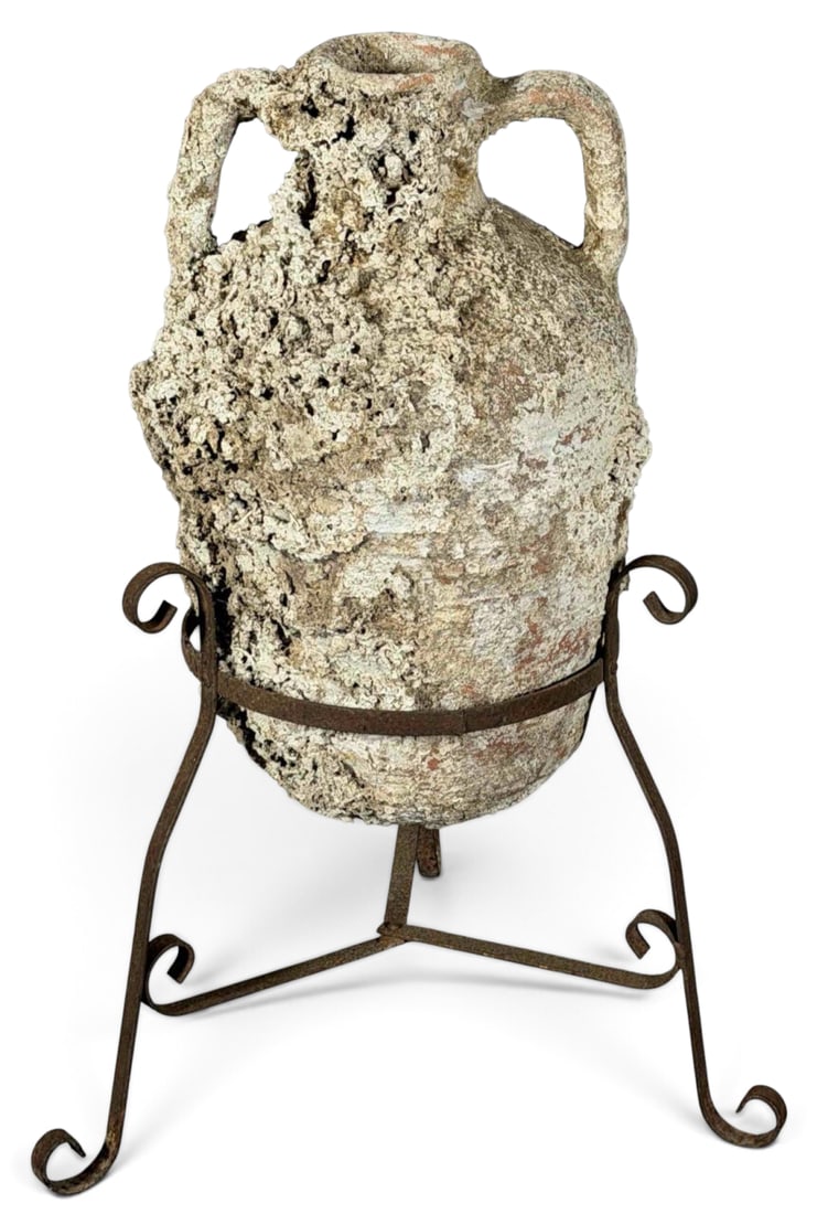 Large Mediterranean Marine-Encrusted Terracotta Amphora: Large terracotta amphora or storage vessel of Mediterranean type, with thick circular mouth, twin loop handles, rounded shoulders, and tapering body. The surface is heavily encrusted with marine