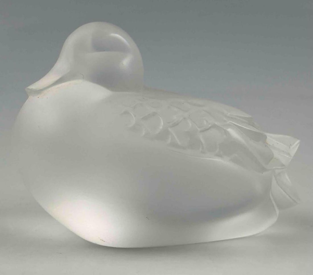 Lalique Canard Dormeur (Sleeping Duck) Crystal Figure: Lalique Canard Dormeur (Sleeping Duck) Clear Crystal Figure. Underside etched "Lalique France." Approximately 1.62H x 2.75L x 1.5W in.
