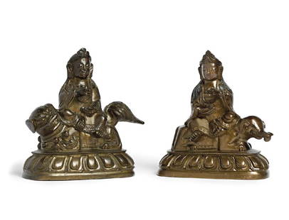 A COUPLE OF FIGURES OF BODHISATTVAS (GUAN YIN AND PU: Bronze, one sitting on a lion and the other on an elephant. Height 3.82 and 3.78 in.